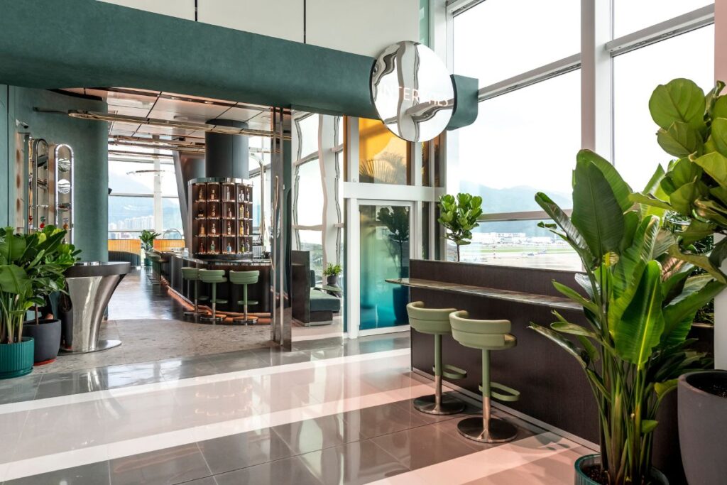 Imelda Ng Hong Kong airport drinking Intervals Bar exterior shot